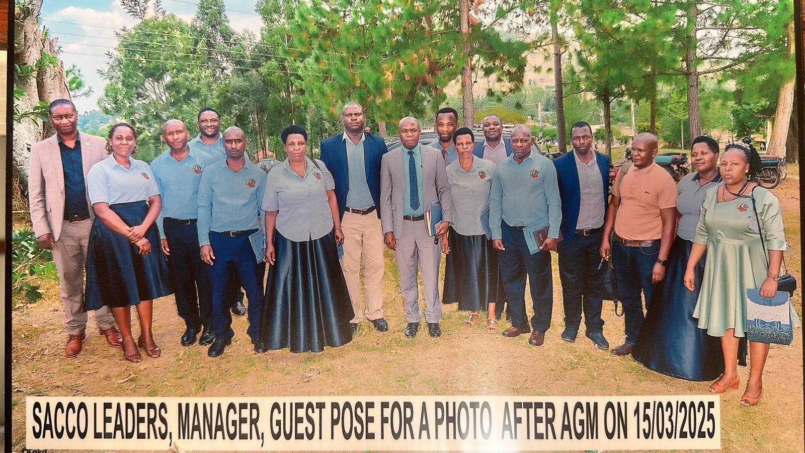 Bisheshe SACCO leaders, manager and guest at the Annual General Meeting